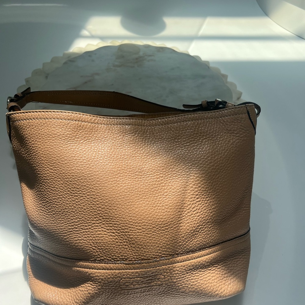 Coach Tan Leather Tote Bag uses fair condition